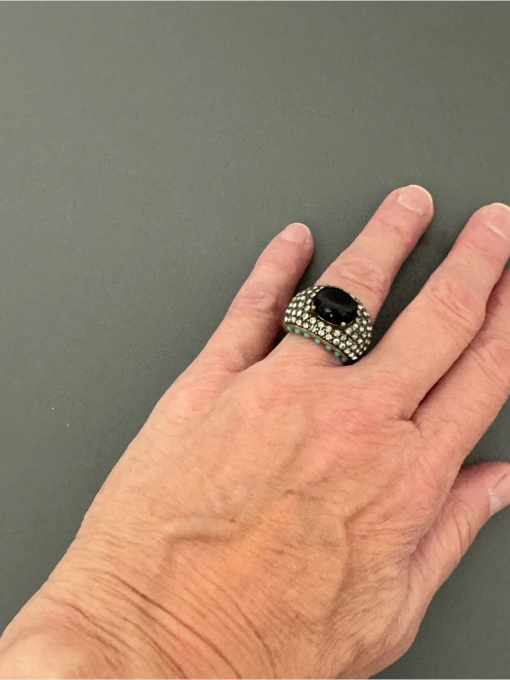Heidi Daus Black Cabochon with crystal pavé and turquoise bead detail.